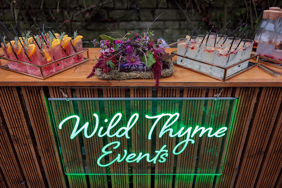 Bar setting for wedding with custom cocktails