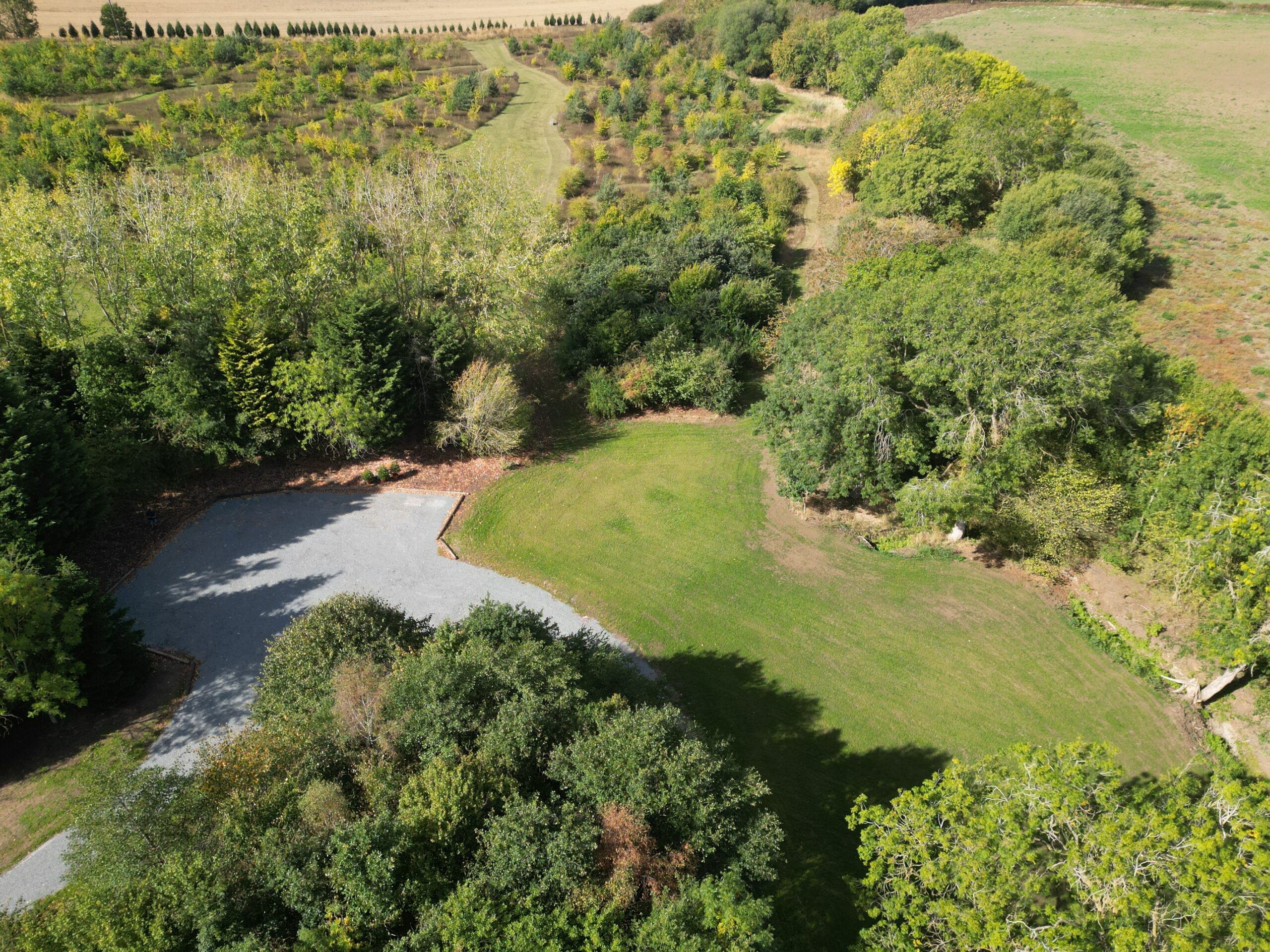 Birdholme glamping grounds showing car park and open space for weddings